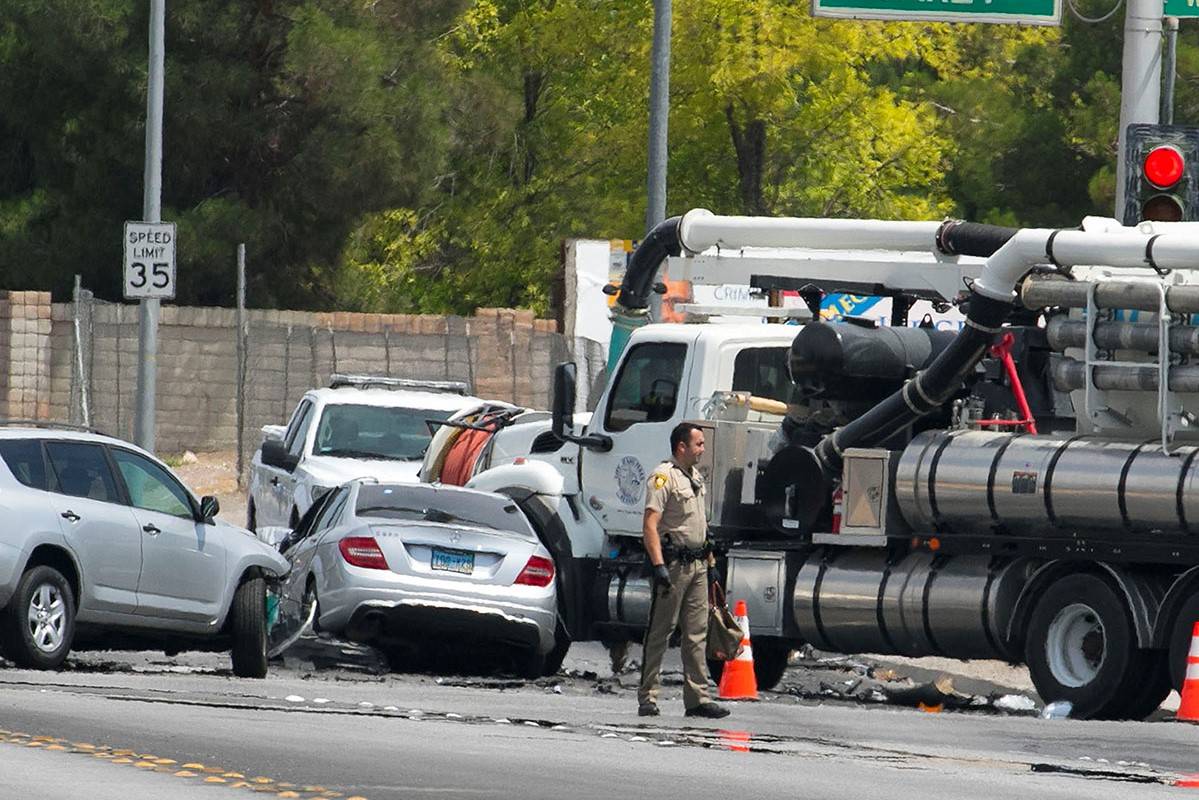 The Metropolitan Police Department investigates a three-car crash at Oakey Boulevard and Rancho ...