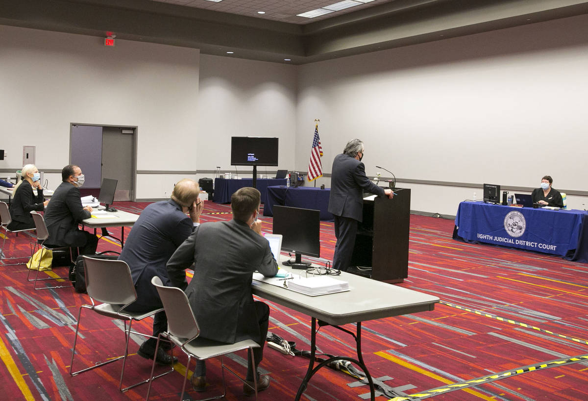 Judge Elizabeth Gonzalez, right, listens as Will Kemp, representing Planet 13 and LivFree dispe ...