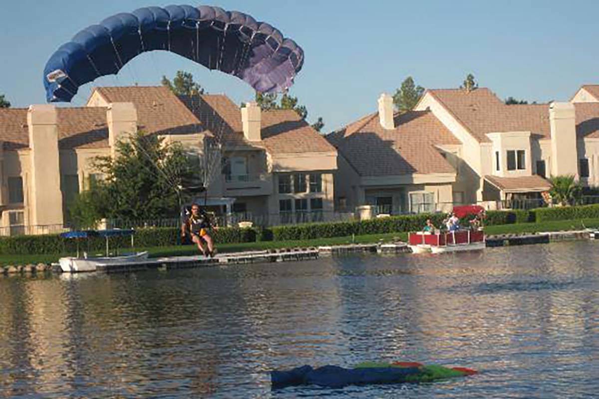 Skydivers at a previous Bastille Day celebration at Marche Bacchus in Desert Shores. (Marche Ba ...