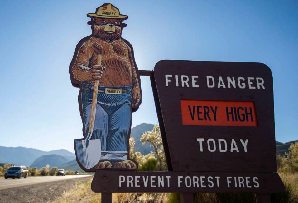 A U.S. Forest Service sign indicating the level of fire risk on Kyle Canyon Road at Mount Charl ...