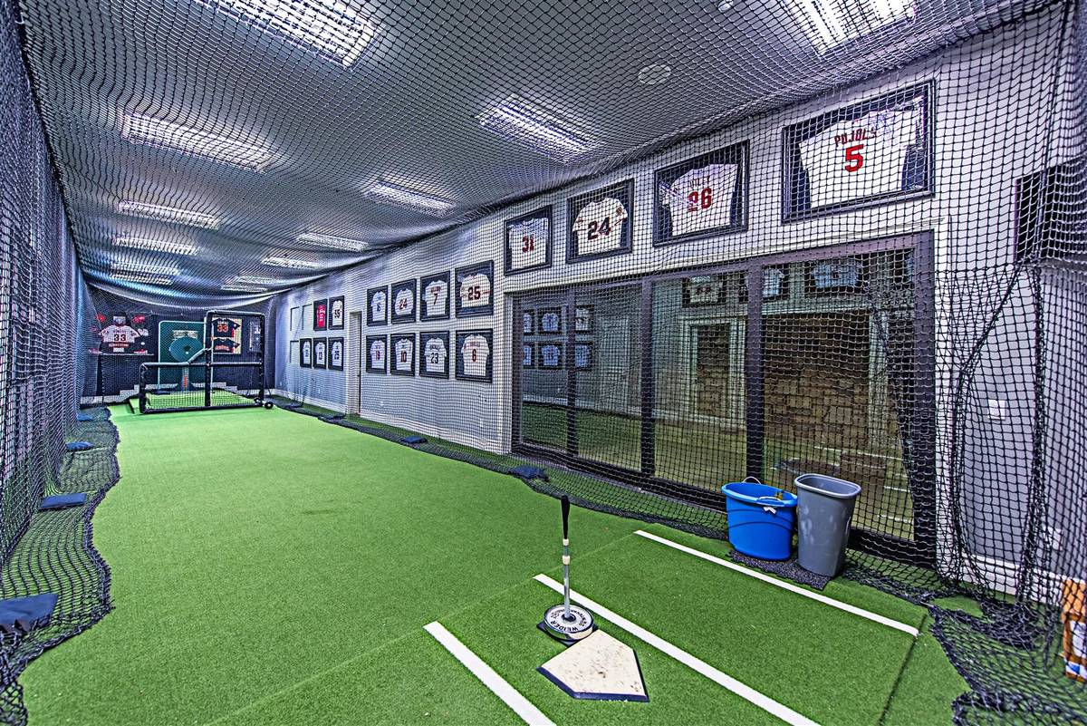 Former Major League Baseball player Aaron Rowand built his 10,948-square-foot home with an indo ...