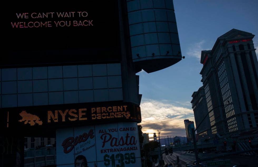 The Bally's marquee shows a message from MGM and stock market information on Tuesday, March 24, ...