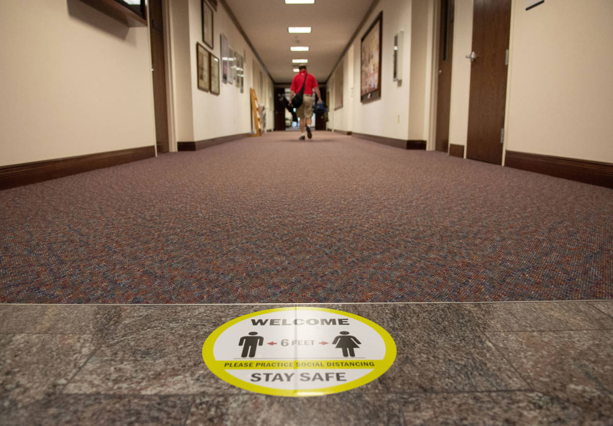 COVID-19 related safety protocol signage inside the Nevada Legislature on the second day of the ...