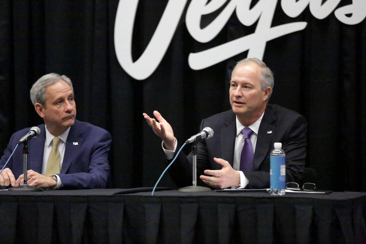 Brian Yost, Las Vegas Convention and Visitors Authority (LVCVA) chief operating officer, left, ...