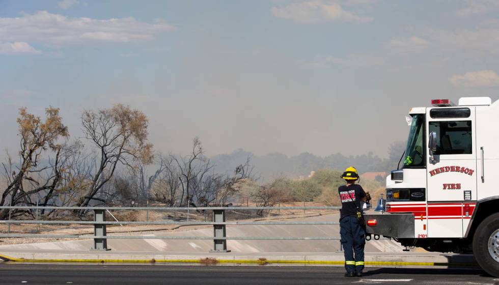 Clark County and Henderson Fire Departments respond to an outside fire on South Pecos Road next ...