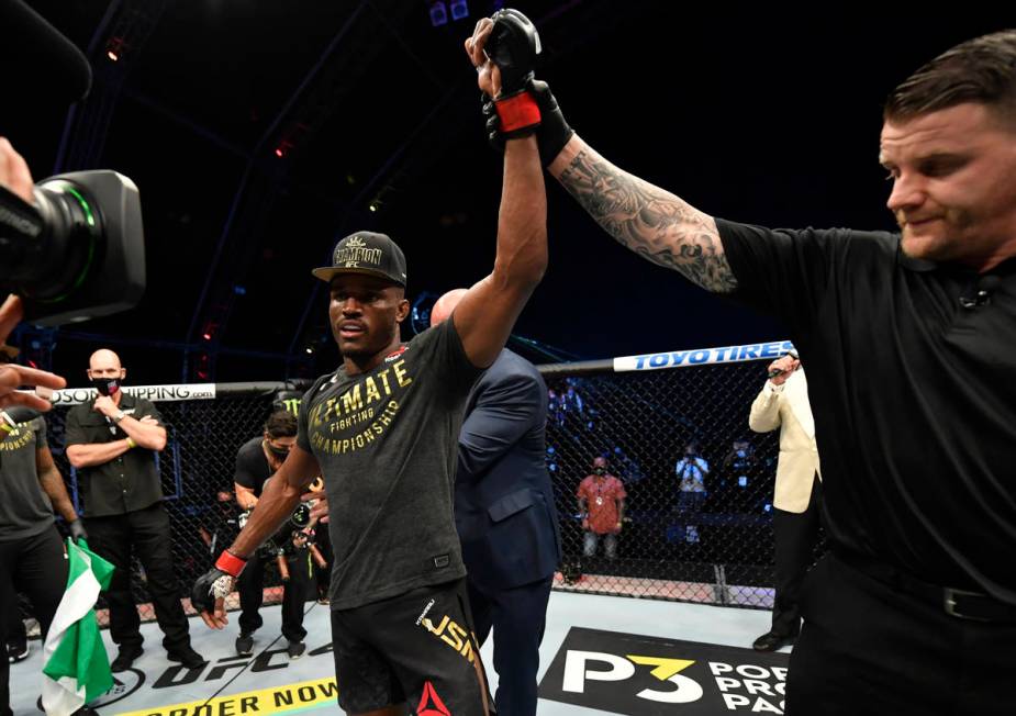 Kamaru Usman of Nigeria celebrates after his victory over Jorge Masvidal in their UFC welterwei ...