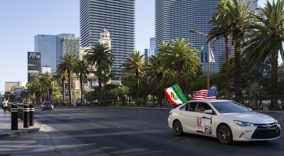 Part of a caravan for Vanessa Guillen moves down Las Vegas Boulevard on Sunday, July 12, 2020, ...