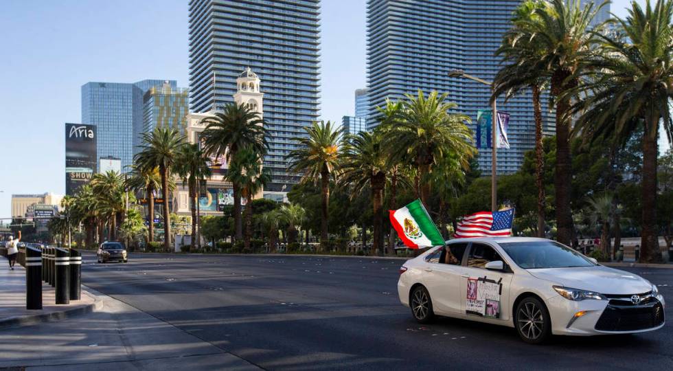 Part of a caravan for Vanessa Guillen moves down Las Vegas Boulevard on Sunday, July 12, 2020, ...