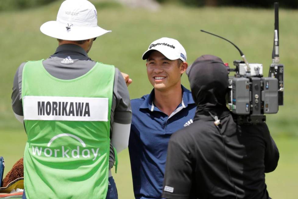 Collin Morikawa smiles after winning the Workday Charity Open golf tournament on the third play ...
