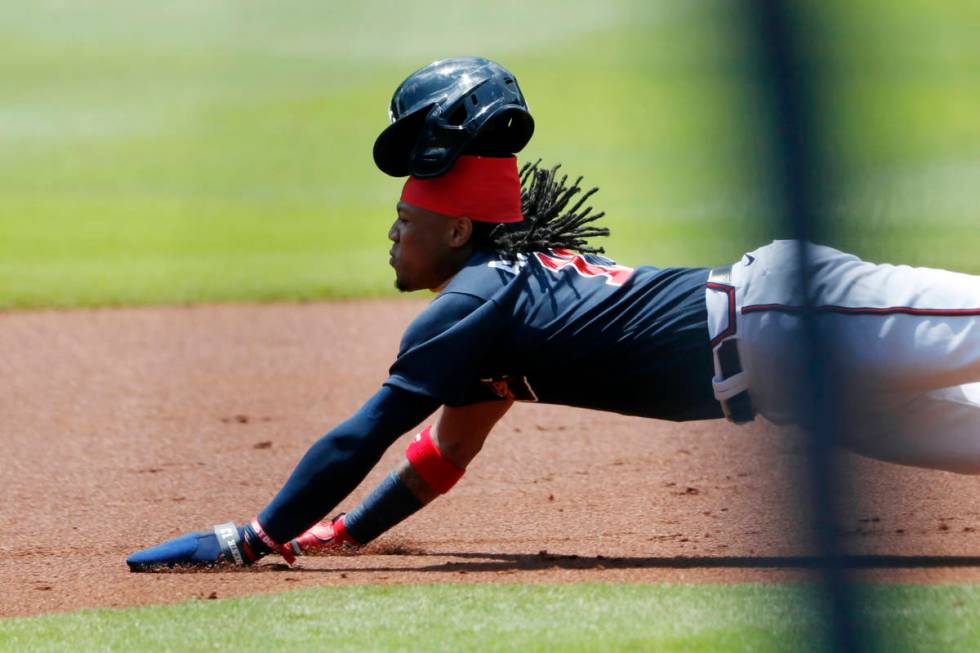Atlanta Braves center fielder Ronald Acuna Jr. (13) steals second base during an intrasquad bas ...