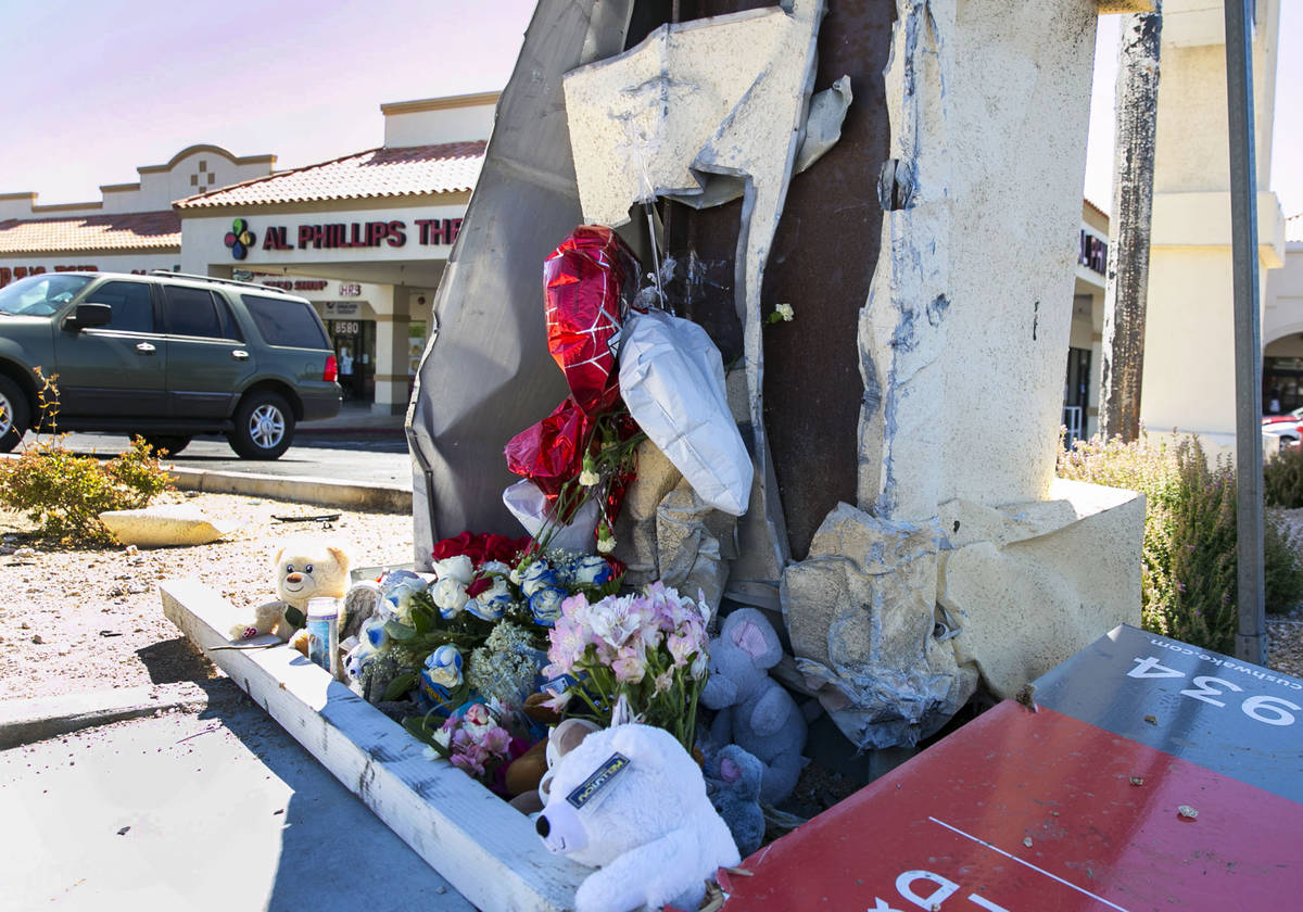 A makeshift roadside memorial at Rampart and Lake Mead Boulevards, where Lauren Prescia crashed ...