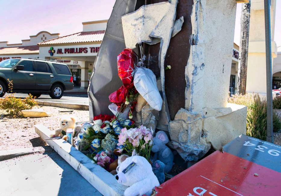 A makeshift roadside memorial at Rampart and Lake Mead Boulevards, where Lauren Prescia crashed ...