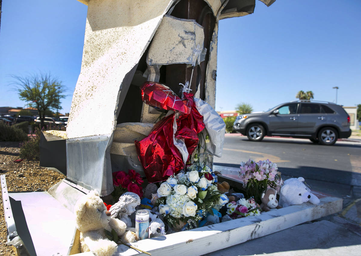A makeshift roadside memorial at Rampart and Lake Mead Boulevards, where Lauren Prescia crashed ...