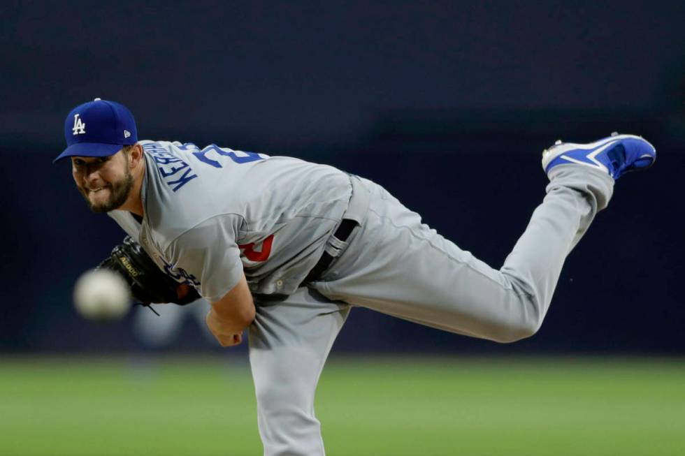 Los Angeles Dodgers starting pitcher Clayton Kershaw works against a San Diego Padres batter du ...