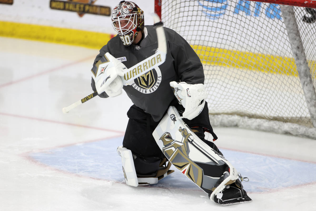 Vegas Golden Knights goaltender Robin Lehner (90) blocks a shot during a team practice at City ...