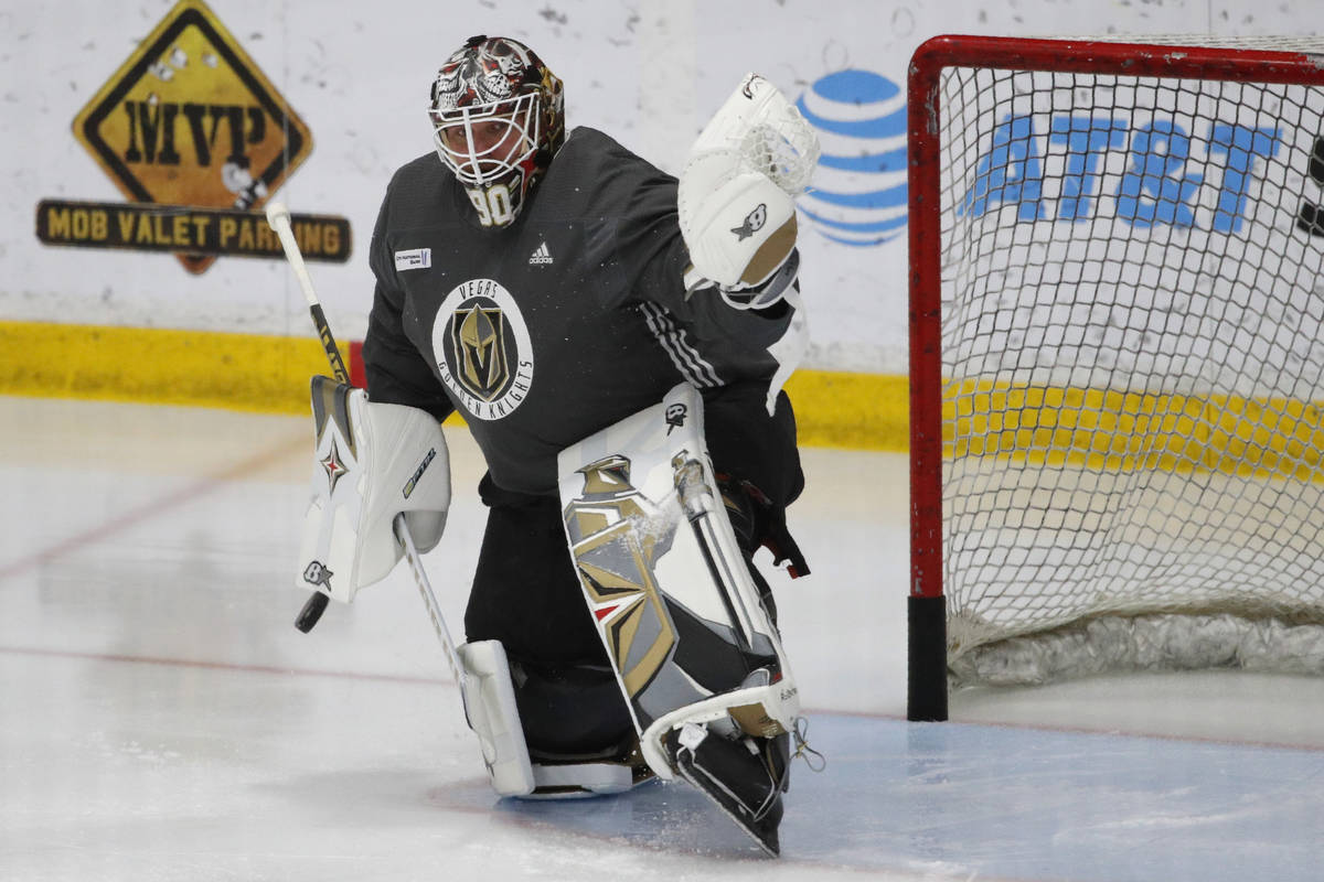 Vegas Golden Knights goaltender Robin Lehner (90) makes a save during NHL hockey training camp, ...