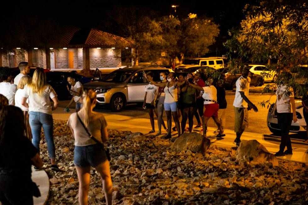 An argument breaks out during a vigil at Buckskin Basin Parkin Las Vegas on Thursday, July 16, ...