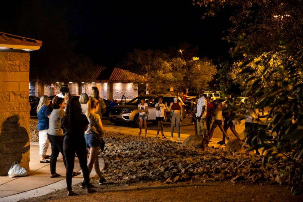 An argument breaks out during a vigil at Buckskin Basin Parkin Las Vegas on Thursday, July 16, ...