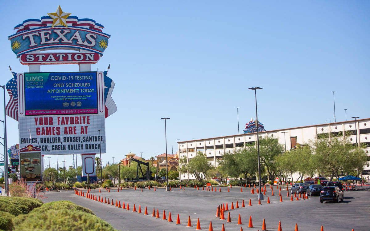 People line up for a coronavirus testing site at Texas Station in Las Vegas on Thursday, July 1 ...