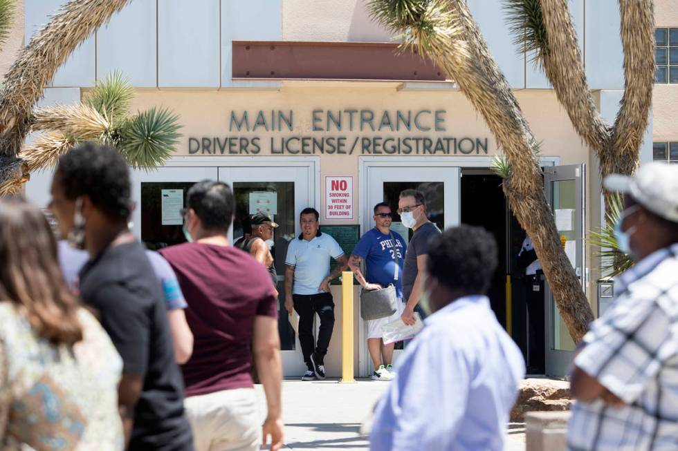 People wait in line at the Nevada Department of Motor Vehicles at 8250 West Flamingo Road, whic ...