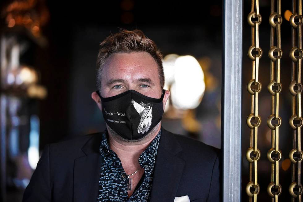 Business partner John Anthony wears a custom face mask at Sparrow + Wolf on Tuesday, July 14, 2 ...