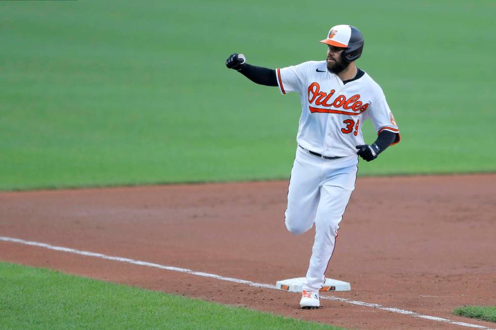 Baltimore Orioles' Renato Nunez gestures after hitting a home run during an intrasquad game at ...