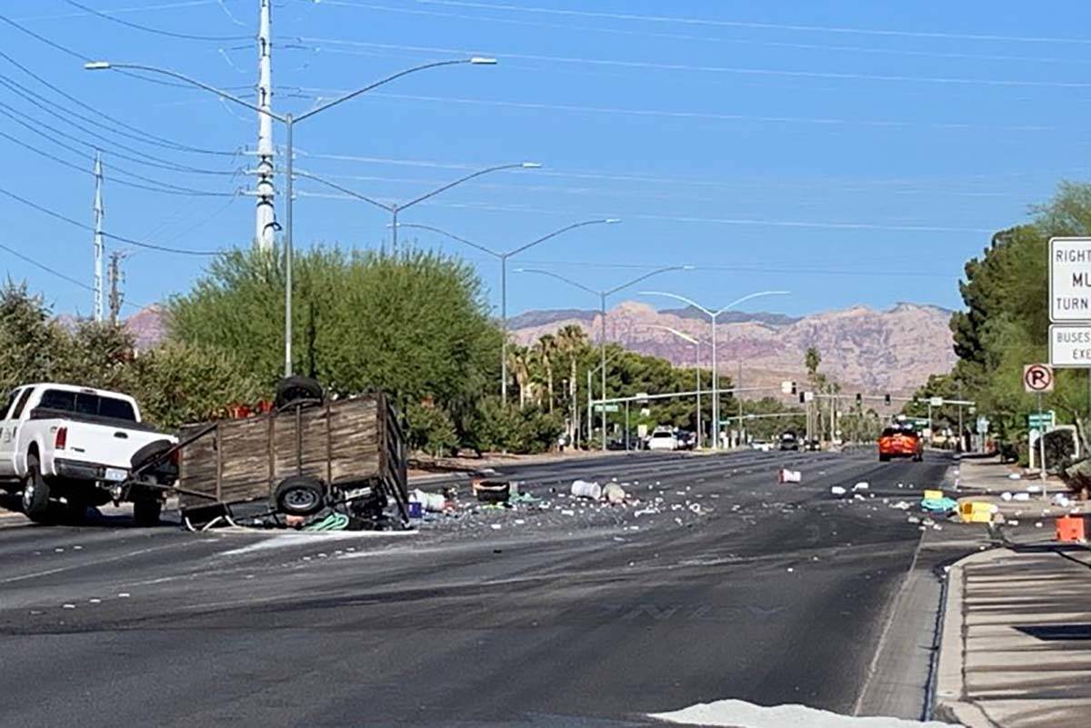 A truck transporting swimming pool chemicals overturned along West Sahara Avenue, between Duran ...