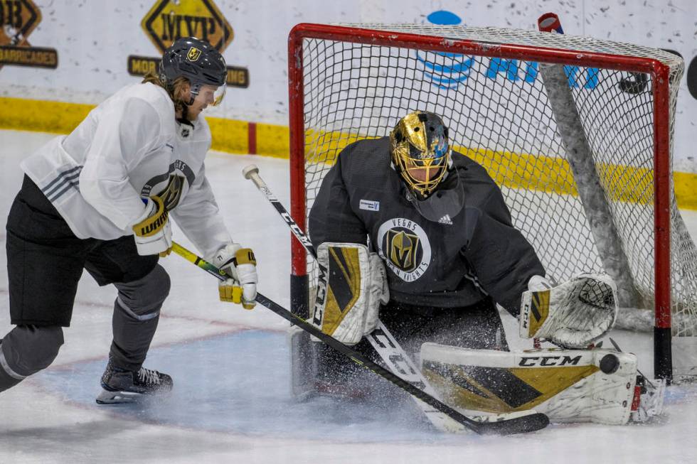 Vegas Golden Knights forward William Karlsson (27) has a shot blocked by goaltender Marc-Andre ...