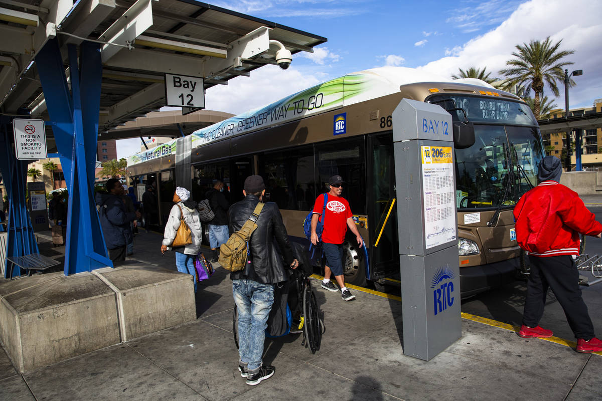 Passengers board and disembark a Route 206 Regional Transportation Commission bus at the RTC Bo ...