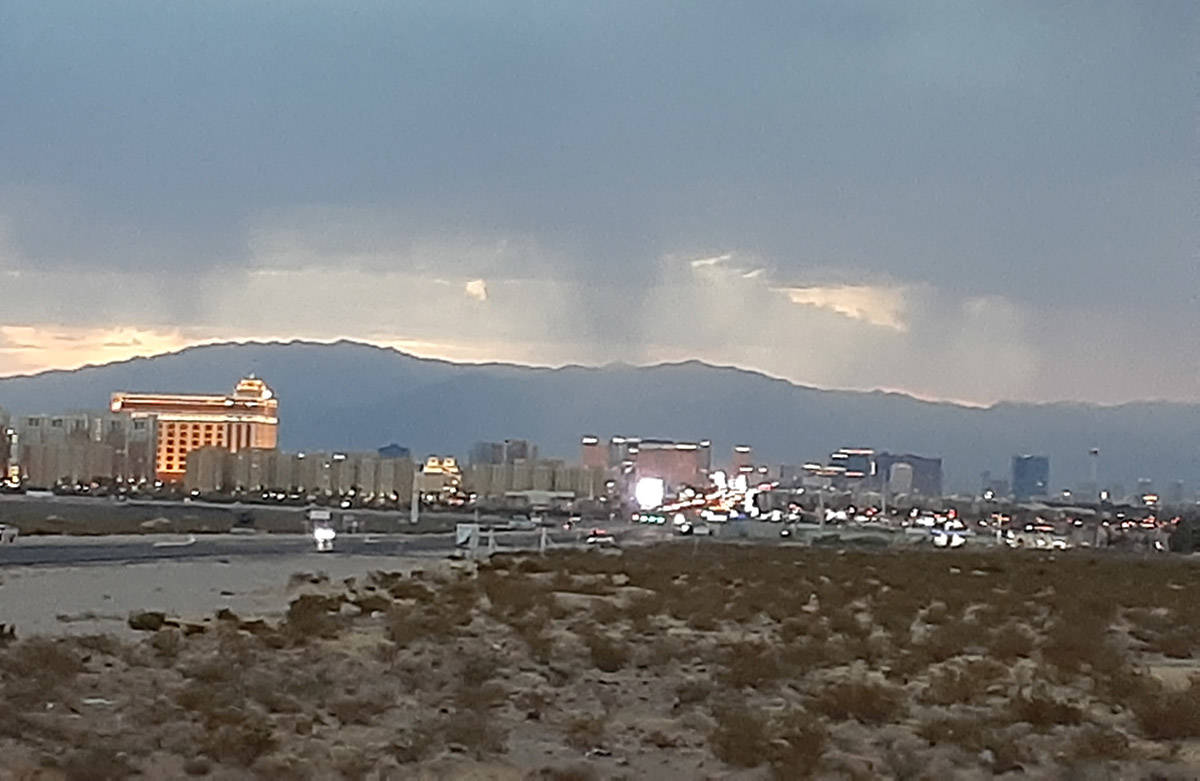 Rain falls from over the Las Vegas Valley on Monday, July 20, 2020. A trace of rain on Sunday, ...