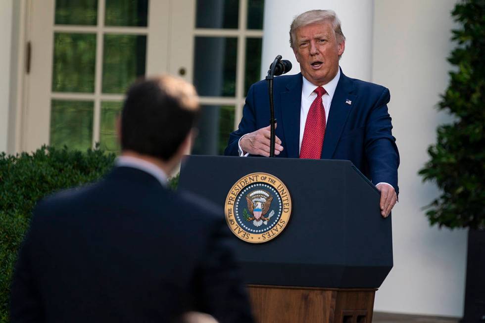 President Donald Trump speaks during a news conference in the Rose Garden of the White House, T ...