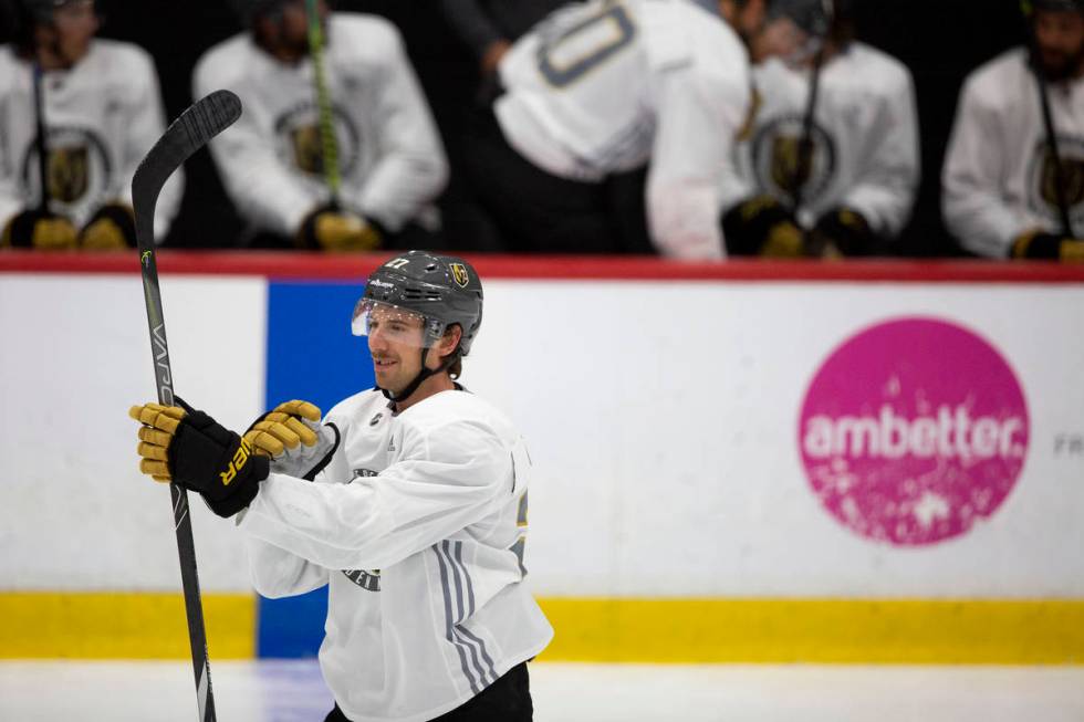 Golden Knights' defenseman Shea Theodore (27) smiles while taking the ice during practice at Ci ...