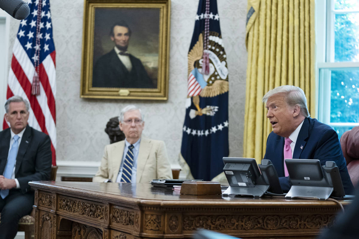 President Donald Trump speaks during a meeting with Senate Majority Leader Mitch McConnell of K ...