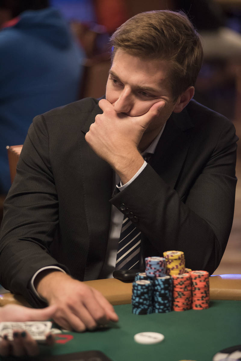 Professional poker player Tony Dunst is seen playing at the Main Event of the World Series of P ...