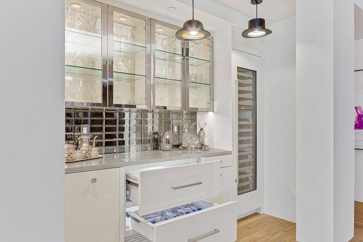 The kitchen has lots of storage space. (Luxe Estates & Lifestyles)