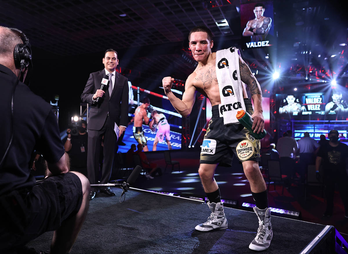 Oscar Valdez celebrates after his knockout of Jayson Velez in their junior lightweight fight on ...