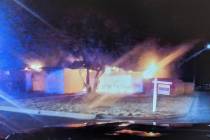 A vacant home burns in the 200 block of Elm Street in central Las Vegas on Wednesday, July 22, ...