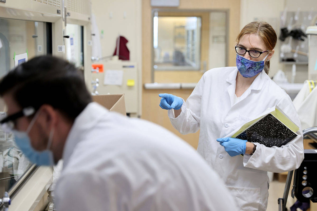 UNLV professor Elisabeth "Libby" Hausrath works with Ph.D. student Anthony Feldman in ...