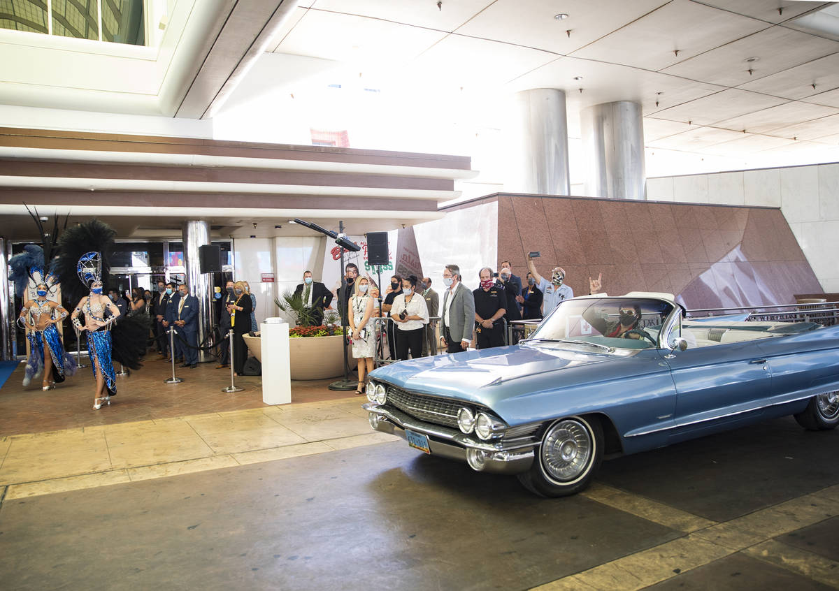 Brendan Paul, impersonating Elvis Presley, pulls up to a ceremony for the reopening of Bally's ...