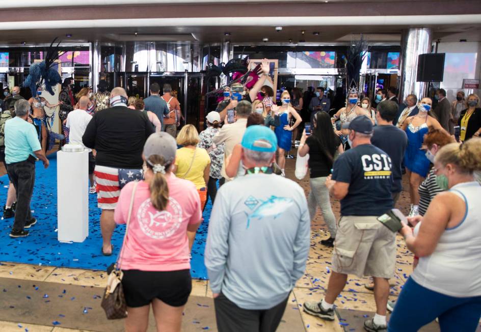 Guests enter Bally's after a reopening ceremony after a months long closure due to the coronavi ...