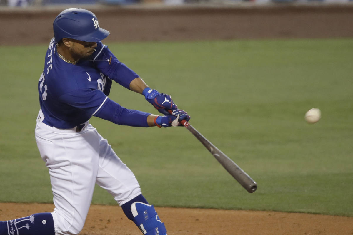 Los Angeles Dodgers' Mookie Betts flies out to center field during the fourth inning of an exhi ...