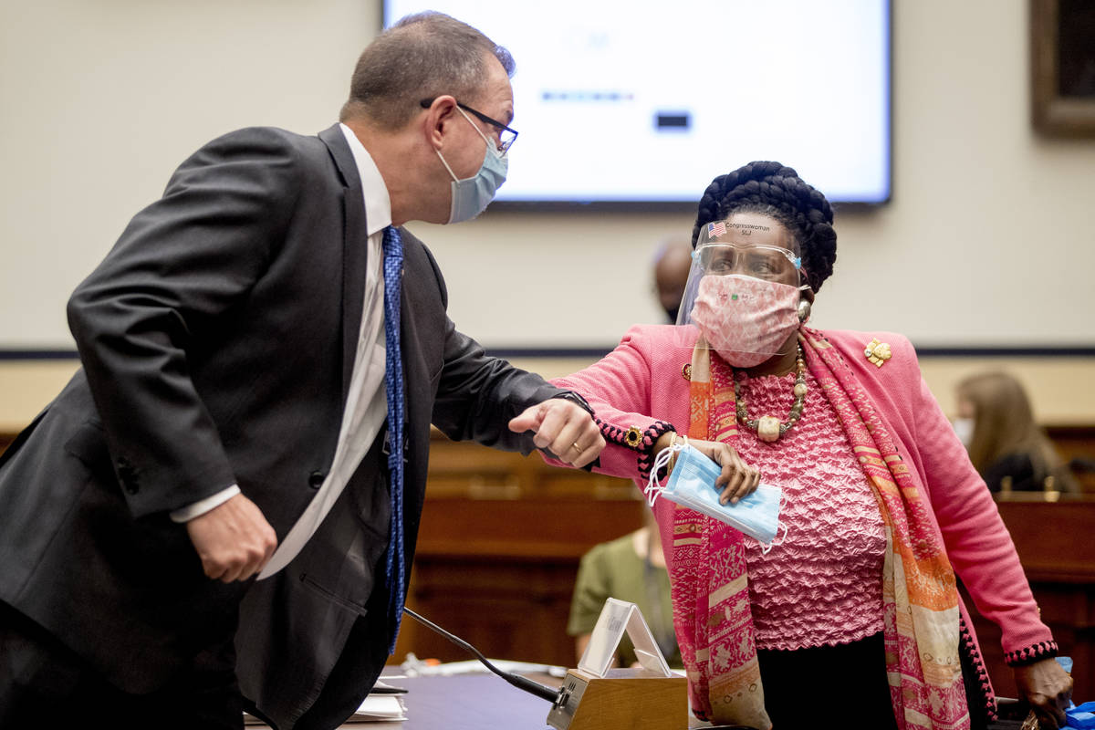 Federal Emergency Management Agency Administrator Peter Gaynor, left, greets Rep. Sheila Jackso ...