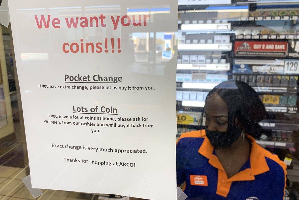 A statement regarding the national coin shortage posted at the AM/PM convenience store at 6775 ...