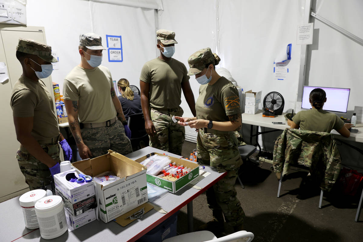 Nevada Air National Guard members, from left, Kevin Davis, Joseph Esquer, Jon Mulla, Maria Bons ...