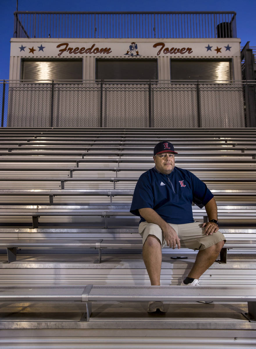 Liberty High School football coach Rich Muraco in the stands on the empty football field on Thu ...