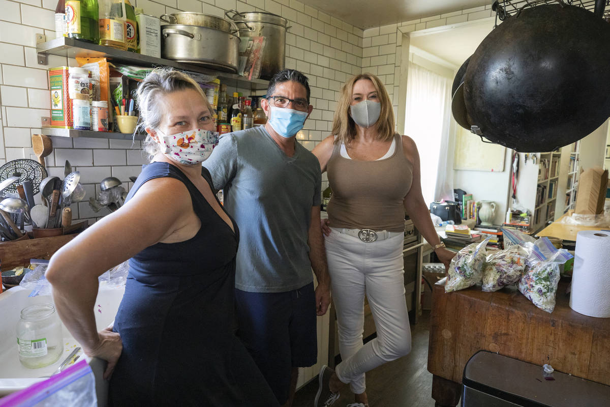 Food writer and lead organizer of Please Send Noodles Kim Foster, left, Chef Luke Palladino, ce ...