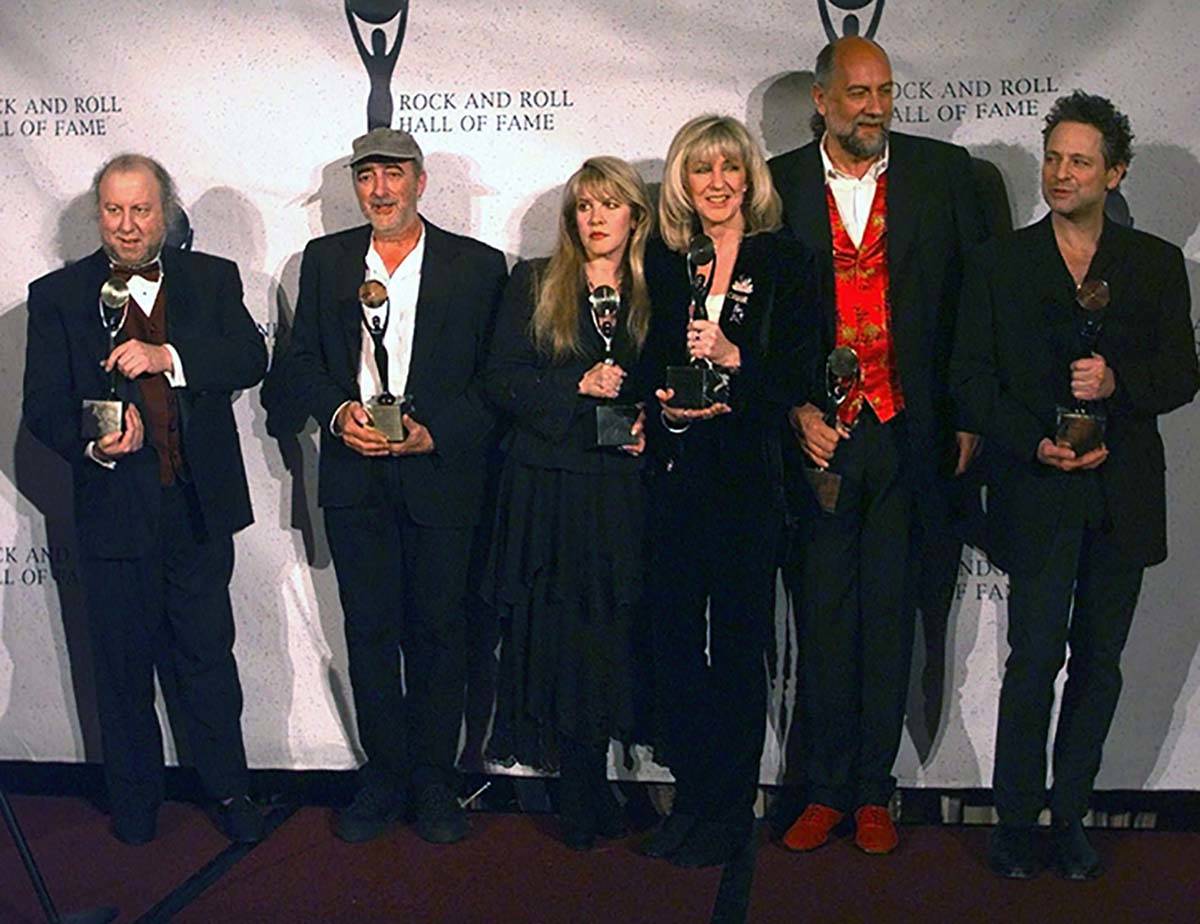 In this file photo dated Monday, Jan. 12, 1998 Members of Fleetwood Mac hold their awards after ...