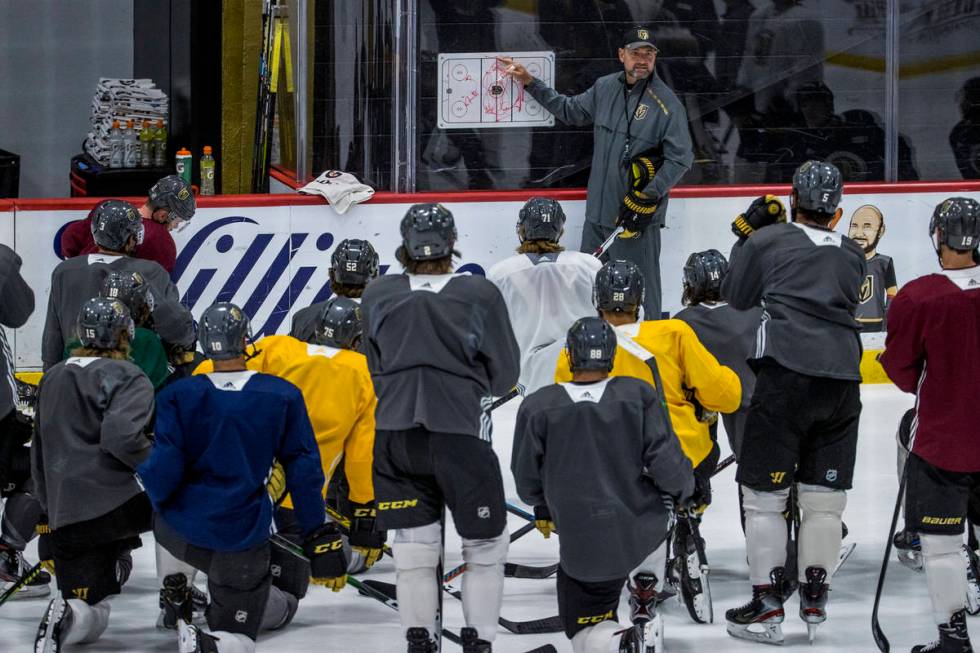 Vegas Golden Knights head coach Peter DeBoer talks about the next drill to his players during p ...