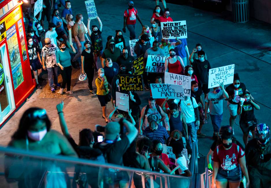 People march during a Black Lives Matter rally on the Las Vegas Strip on Saturday, July 25, 202 ...