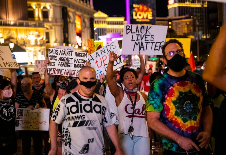 People march during a Black Lives Matter rally on the Las Vegas Strip on Saturday, July 25, 202 ...